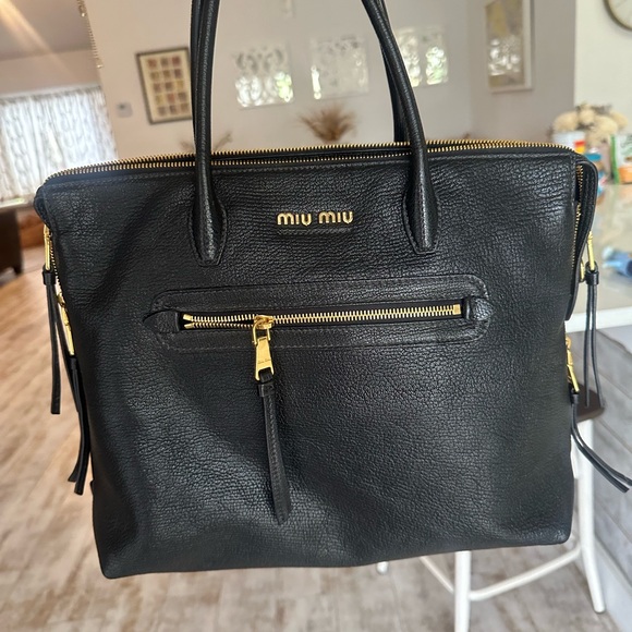 Miu Miu Handbags - Miu Miu Black Leather Handbag with Gold Accents